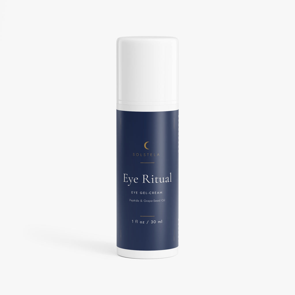 Solstela Eye Ritual eye gel-cream, navy airless pump bottle with a white cap, on a plain pale background